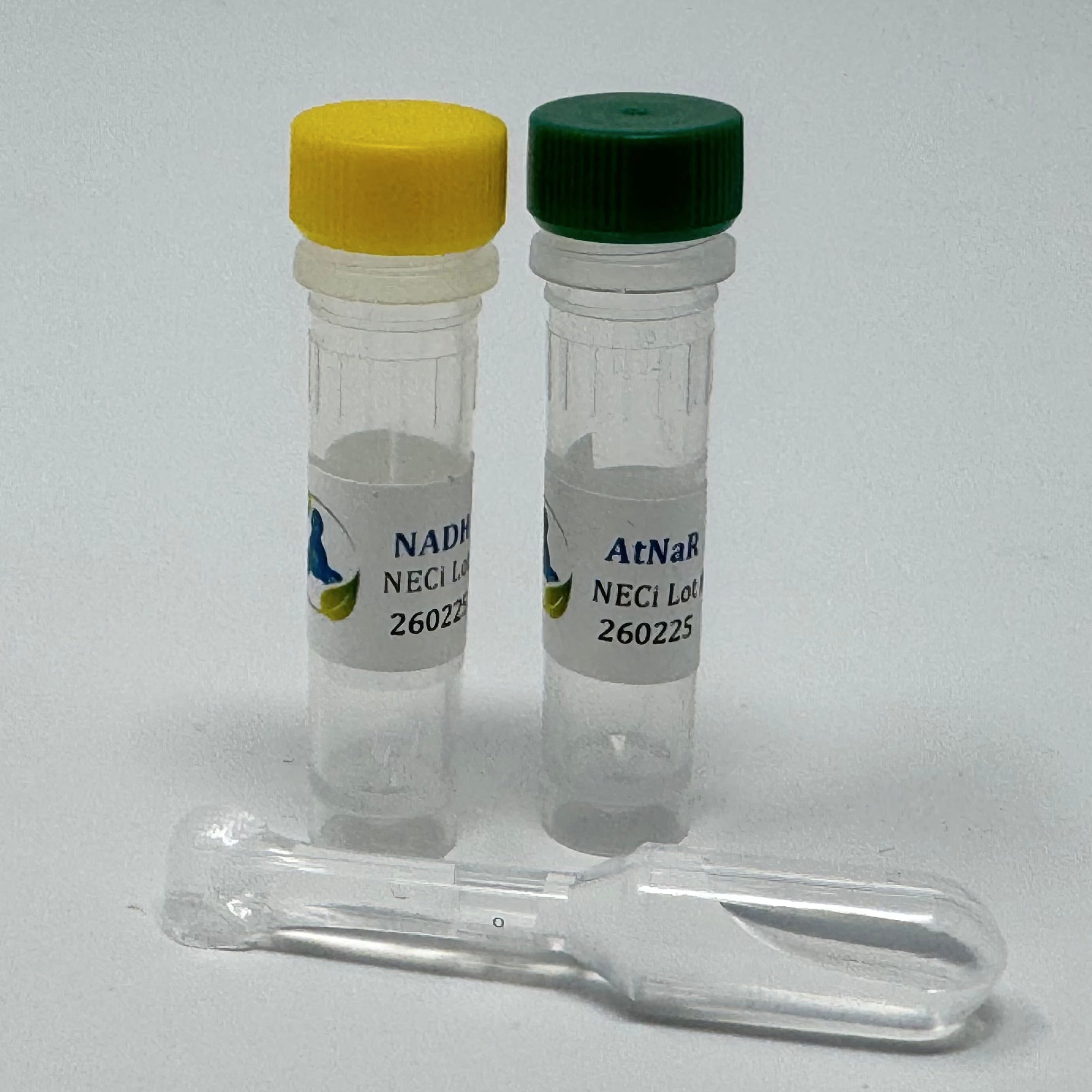 AtNaR Nitrate Reductase Reagents Kit for Standard Discrete Analyzers - Two tubes with yellow and green caps labeled 'NADH' and 'AtNaR', and a vial of enzyme diluent