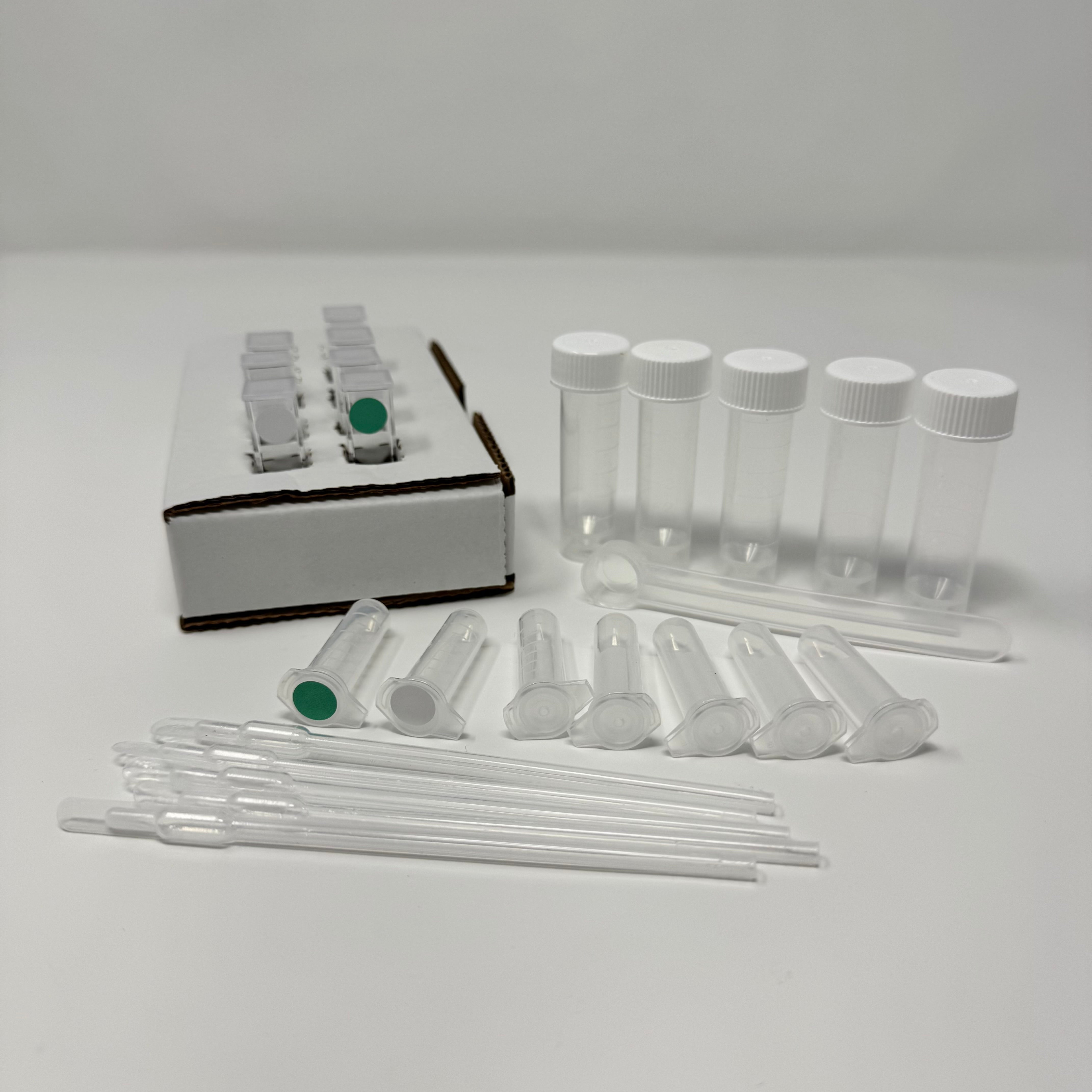 Soil Phosphate Test Kit - kit contents including reaction cuvettes, buffer, sample collection tubes, pipettes, measuring spoon, and cardboard cuvette holder