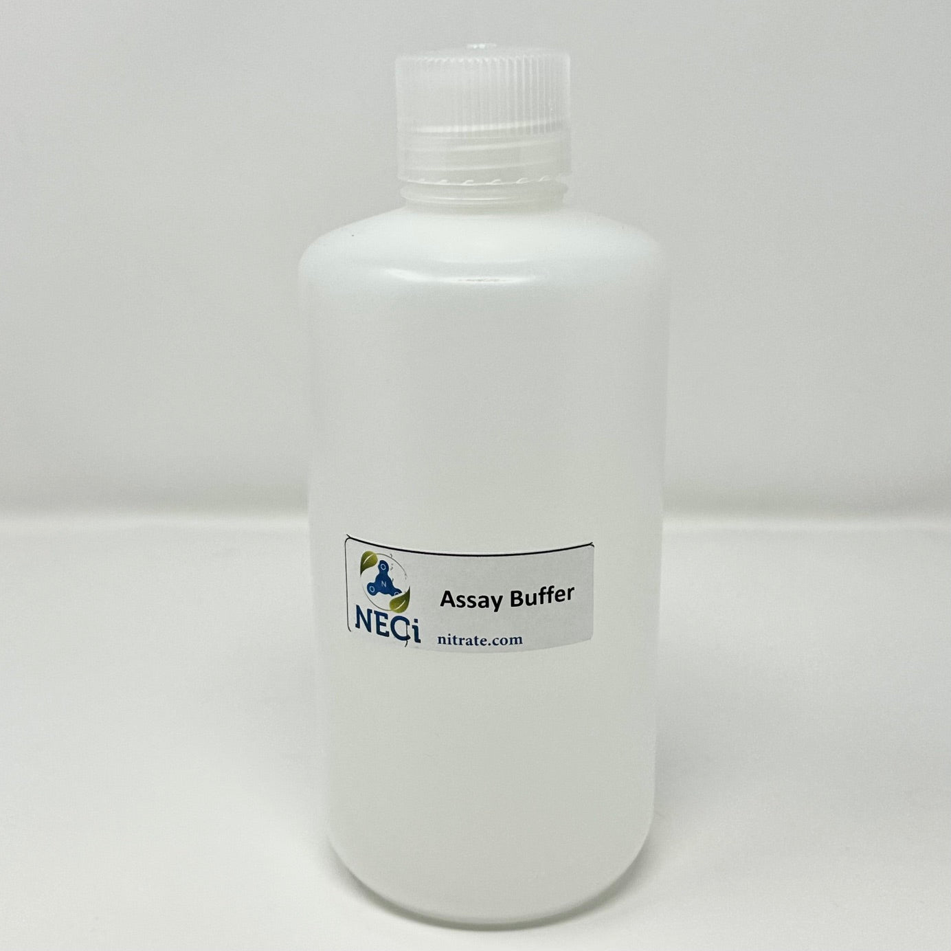 White plastic 1 liter bottle of Assay Buffer, with label showing the NECi brand and nitrate.com website.