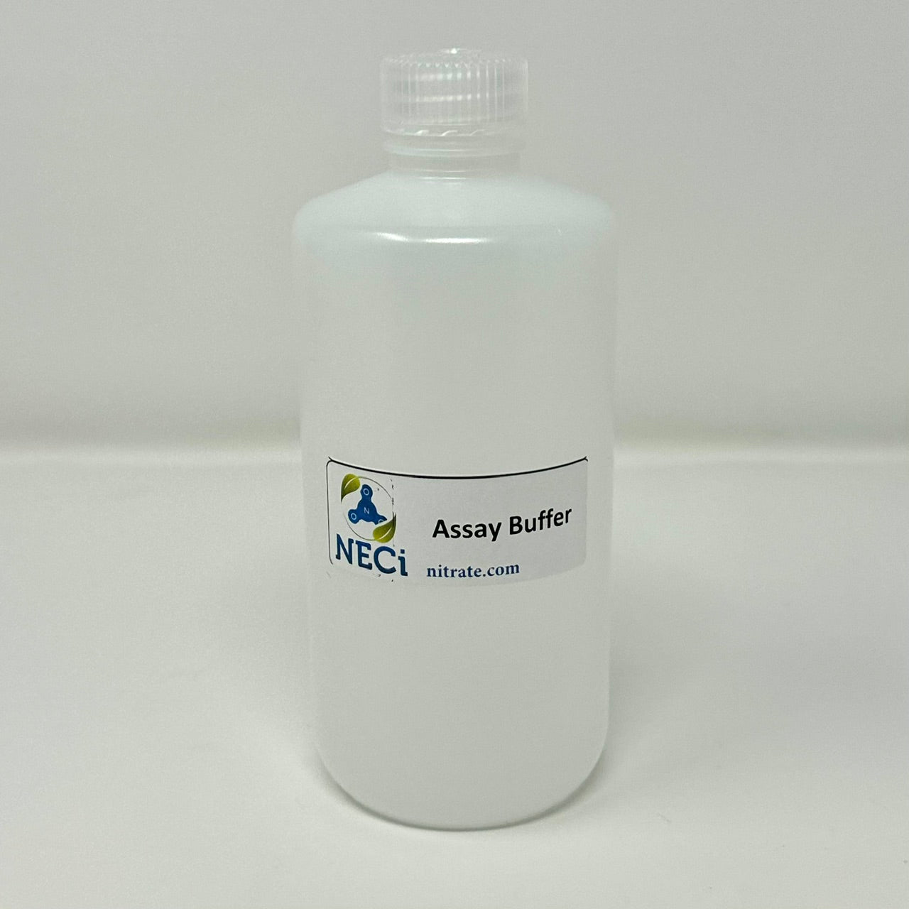 White plastic 500ml bottle of Assay Buffer, with label showing the NECi brand and nitrate.com website.