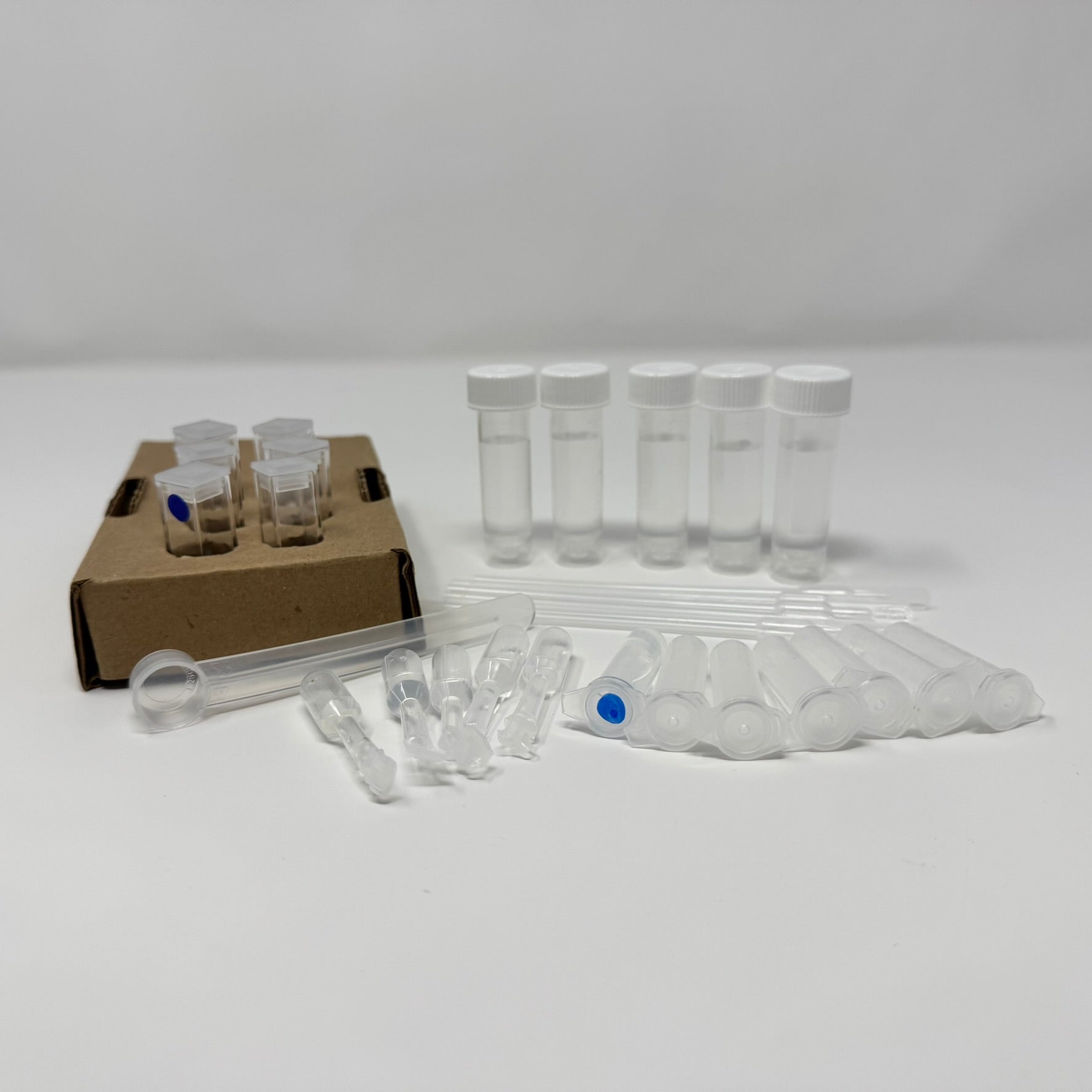Soil Nitrate Test Kit - Complete kit contents including reaction cuvettes, buffer, color reagents, sample collection tubes, measuring spoon, and cardboard cuvette holder